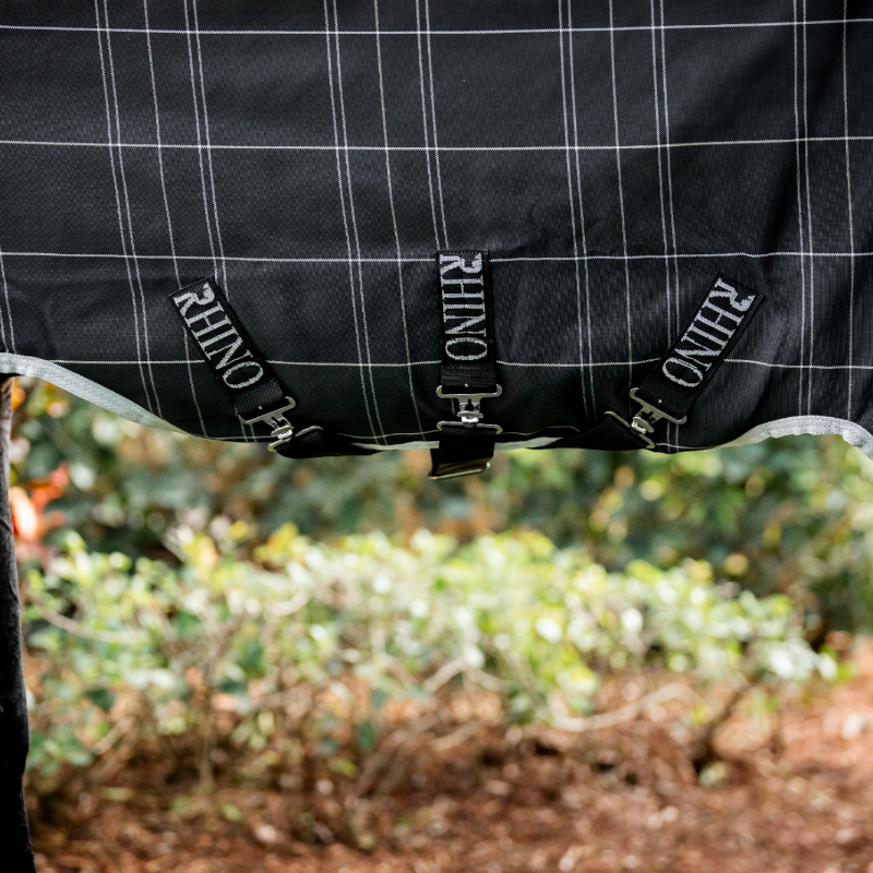 Horseware - Couverture d'extérieur Rhino Wug Turnout noir/ gris/ blanc à carreaux 100g | - Ohlala