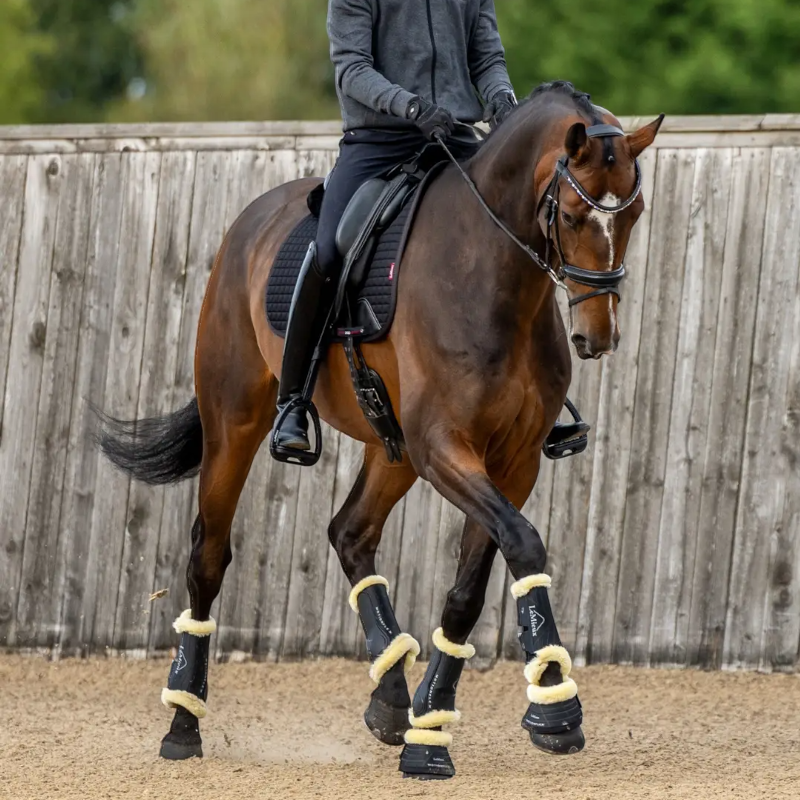 Lemieux - Guêtres de dressage Motionflex avec fourrure noir/ naturel | - Ohlala